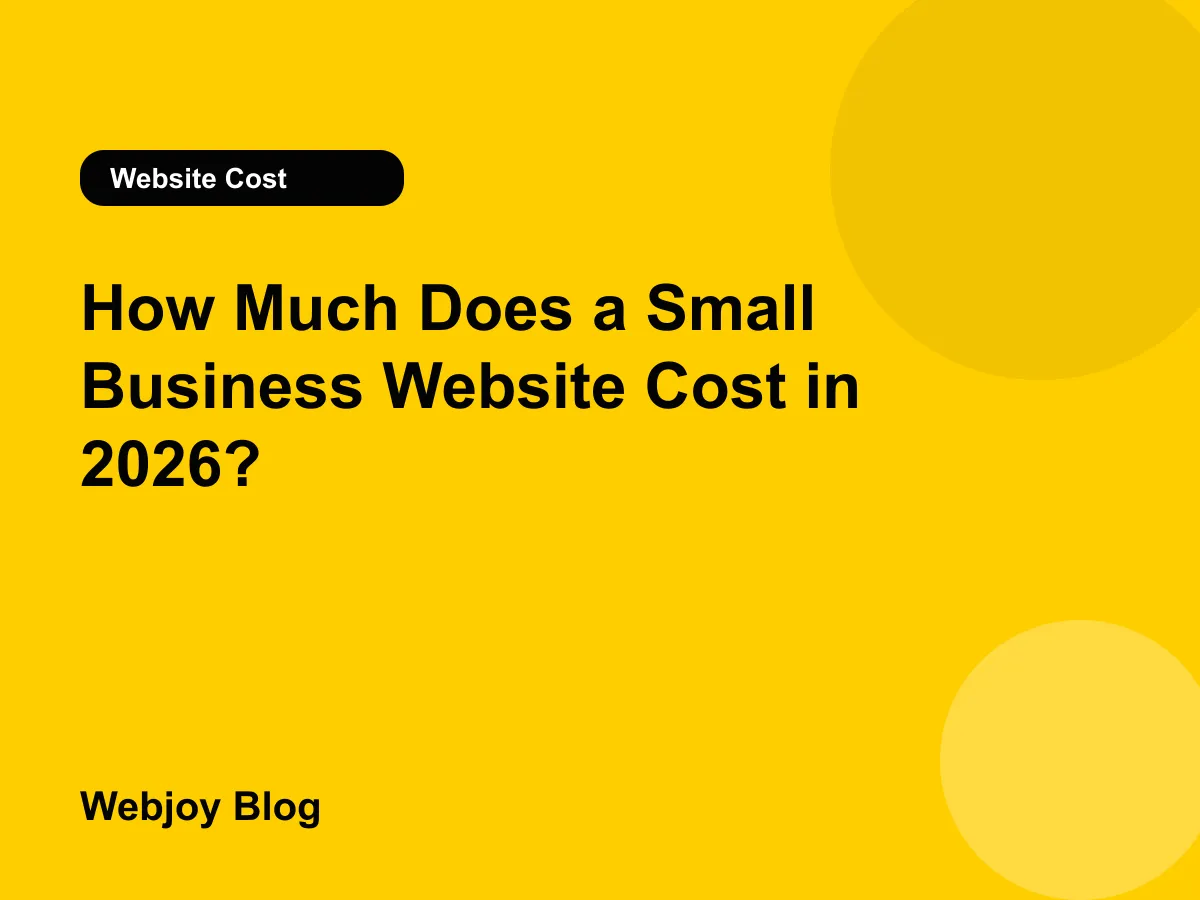 Small business owner at a counter comparing website price options on a laptop